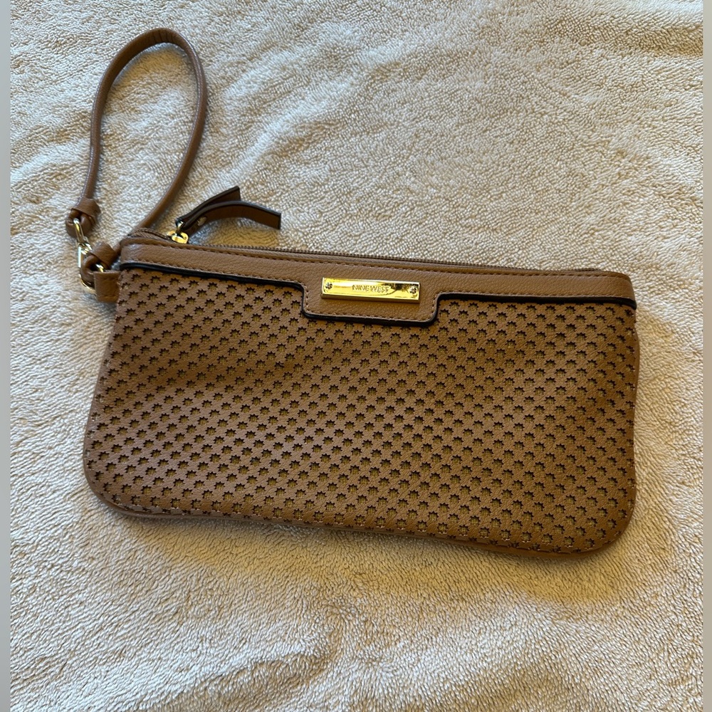Tan Nine West wristlet bag.
